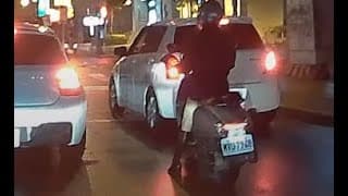 夜的第腿章 之 汽車壓到機車格章